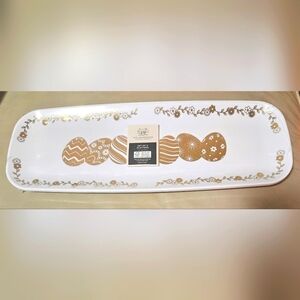 Set of 3 platters with the print of gold metalic easter eggs on it.